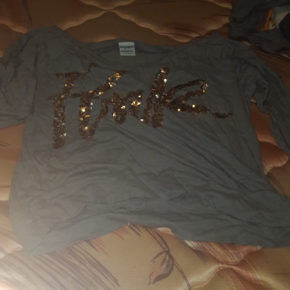 A gray and gold shirt